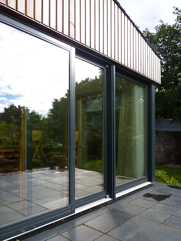 Patio in North Kelvinside house extension by Scottish architect