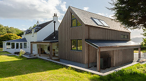 Rear of architect designed timbre clad extension with views over Loch Linnhe and Morvern