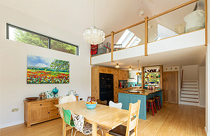 extension with open-plan kitchen dining and gallery above